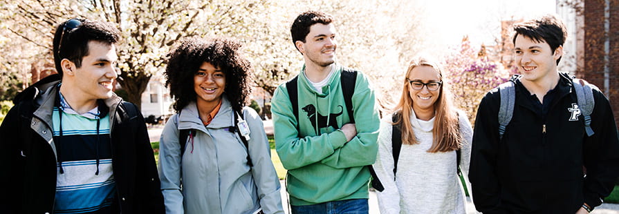 Students Walking Across Campus