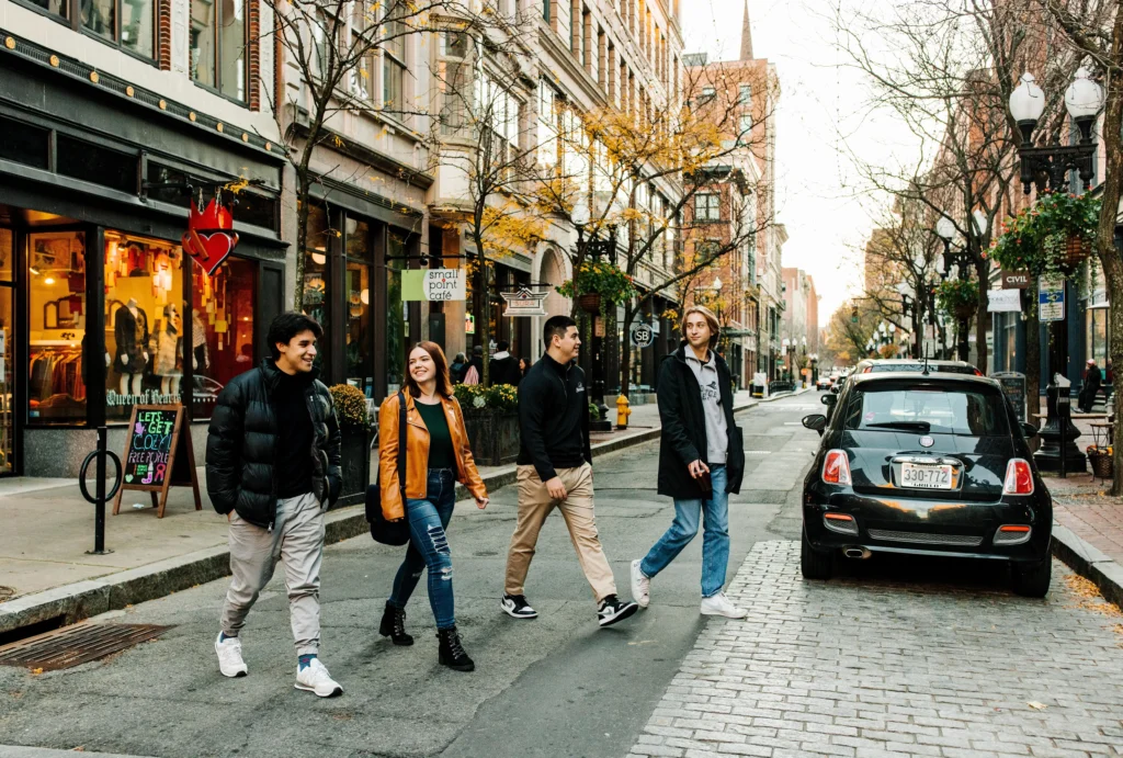 Group of PC students crossing a street in downtown Providence