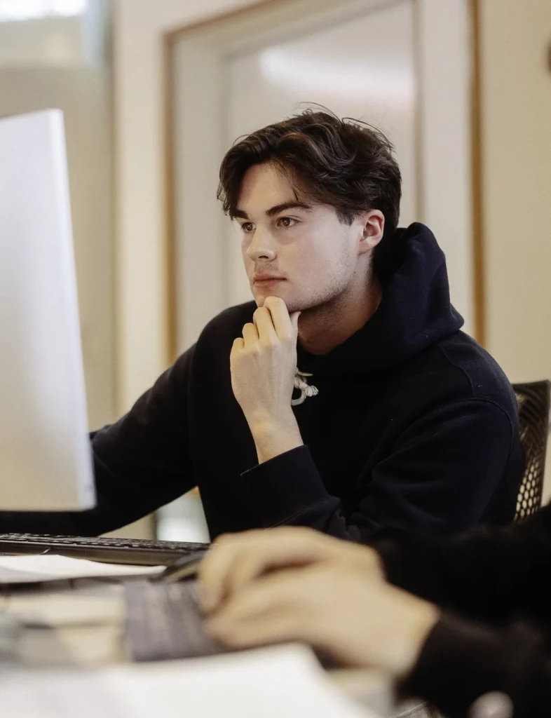PC student working on a computer
